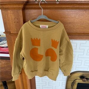Kids Tan Sweatshirt with Orange Accents